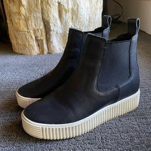 DOLCE VITA black leather platform booties.